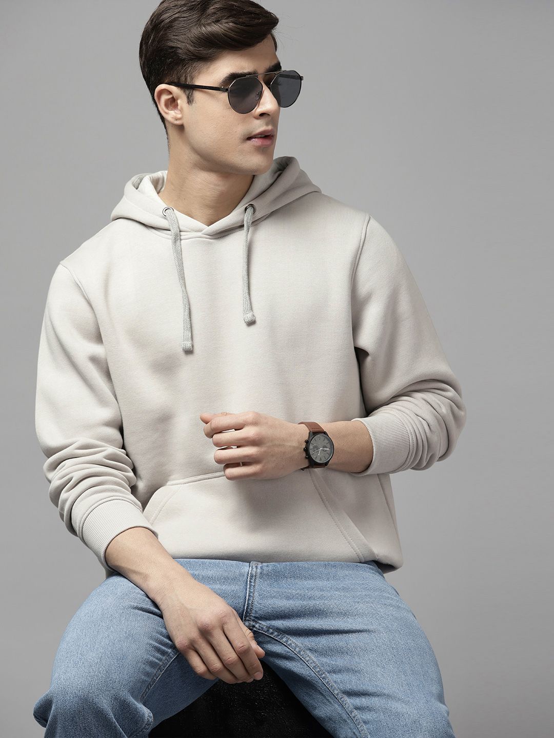 06271946-be59-476d-bb62-0b4d81c961611672651142670-Roadster-Men-Sweatshirts-91672651142282-1.jpg Roadster Men Solid Hooded Sweatshirt - Image 1