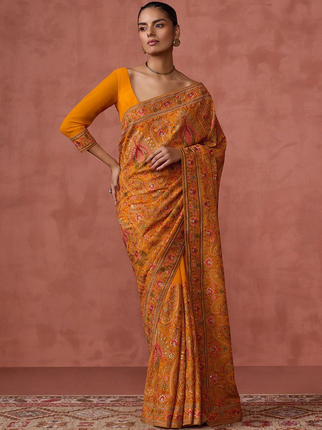 8q6dDLsM_4350de9895584c9d858096c80a47325b.jpg Soch Ethnic Motifs Embroidered Sequinned Pure Georgette Saree - Image 1