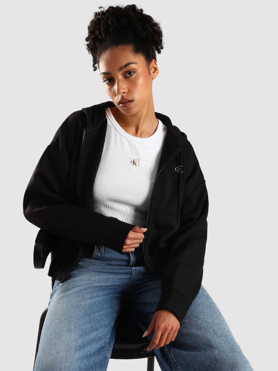 OmAWNPxi_e3290c10e3ad48ff8680ec48bf95b417.jpg Calvin Klein Jeans Women Regular Fit Cotton Hooded Neck Zip-Front Sweatshirt - Image 1