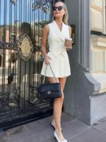 White Sleeveless Double-Breasted Vest & Accordion Pleat Mini Skirt Co-ord Set - Image 4